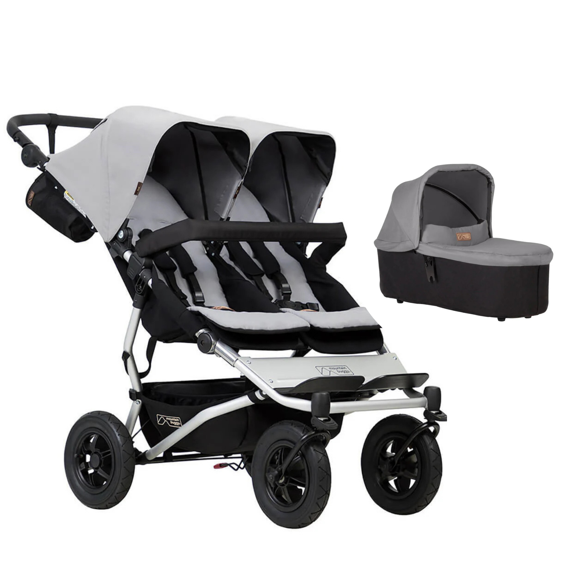 Gray double stroller with bassinet from Mountain Buggy Duet, perfect for Toshi Baby