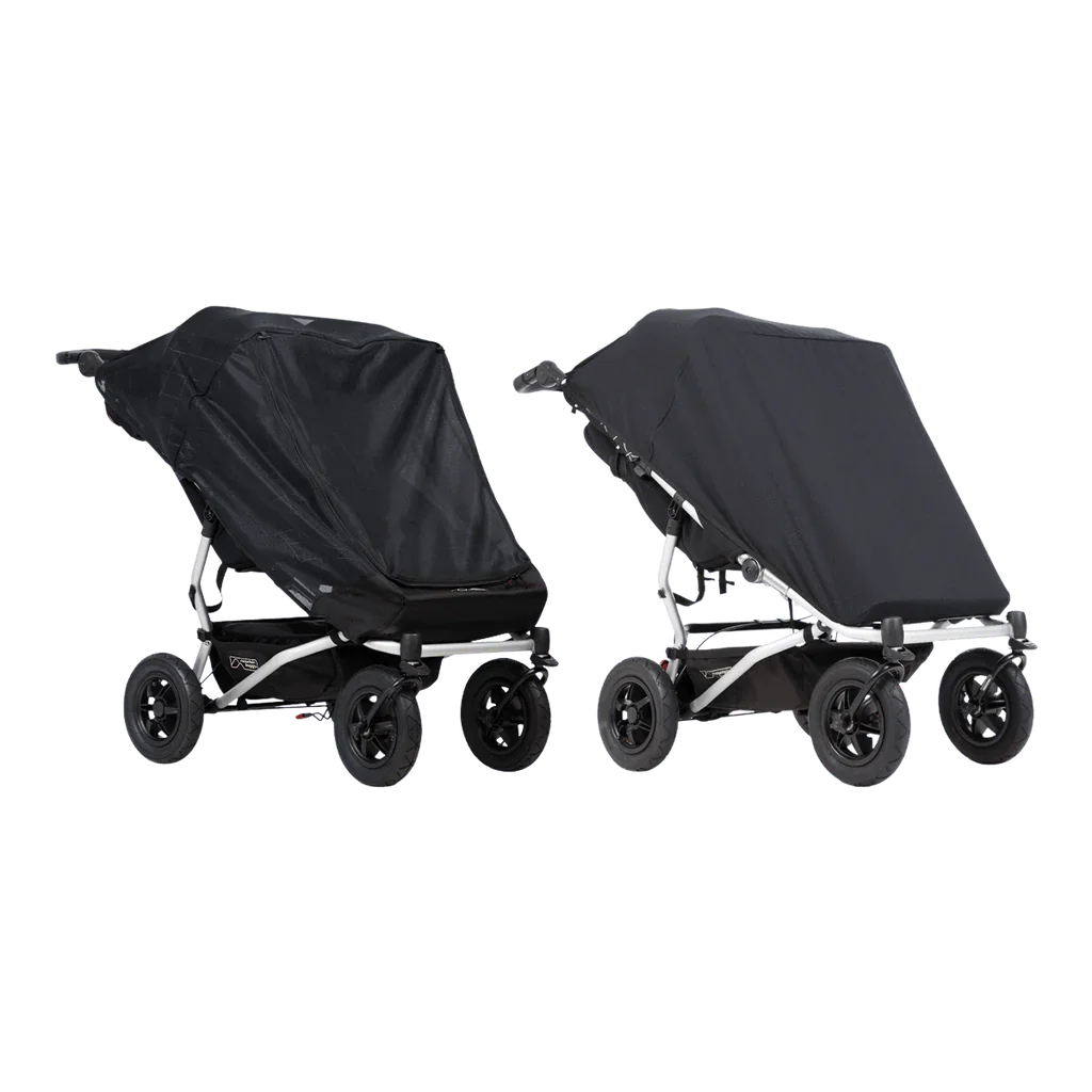 Mountain Buggy Duet double sun cover on two black Toshi Baby strollers for sun protection