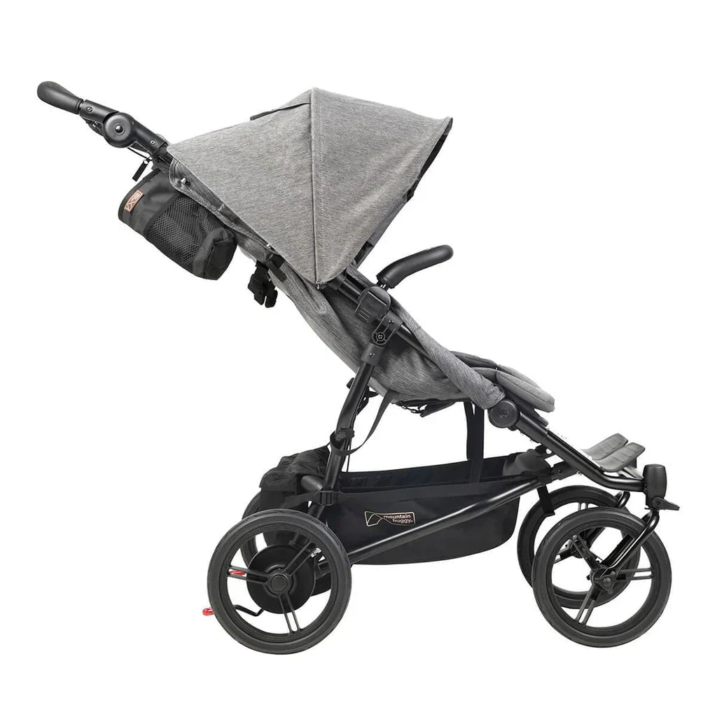 Gray and black stroller from Mountain Buggy Duet‚Ñ¢ Luxury Collection with Double Carrycot