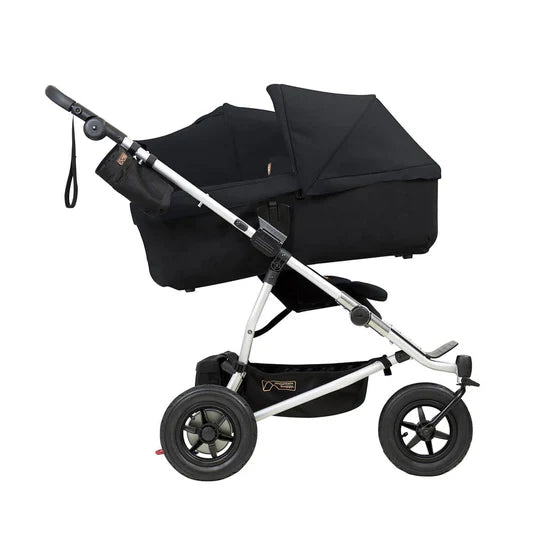 Black double stroller with silver frame from Mountain Buggy Carrycot Plus for Duet‚Ñ¢