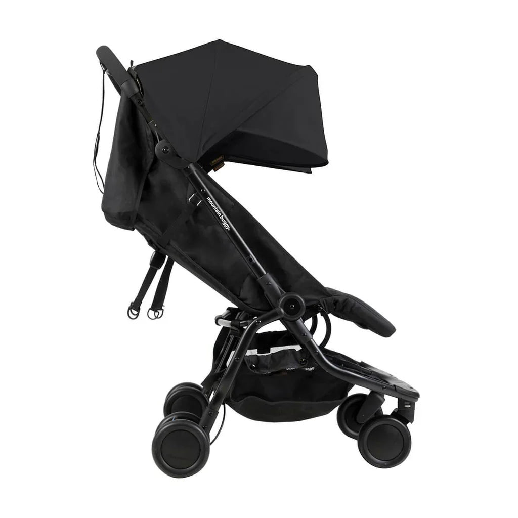Black compact stroller from Mountain Buggy Nano series with Toshi Baby cup holder