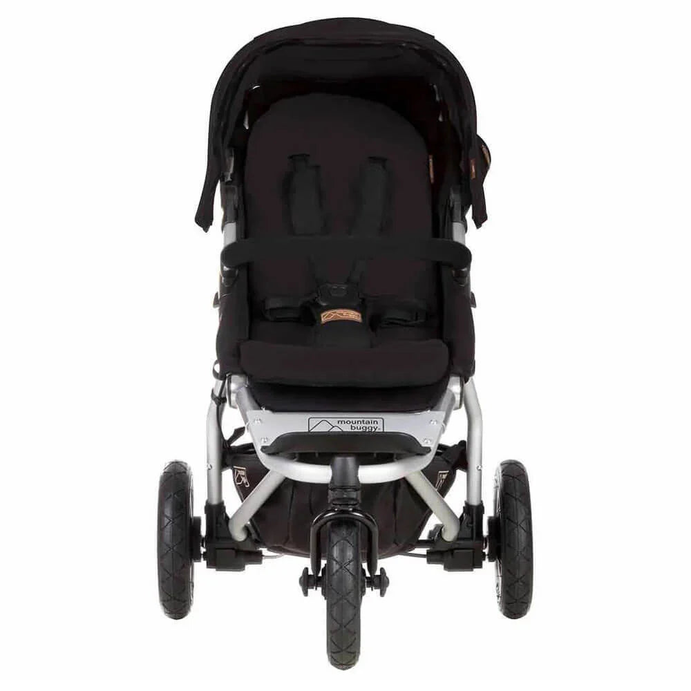 Black three-wheeled stroller from Mountain Buggy Swift with Odyssey Wagon Wheels for smooth rides