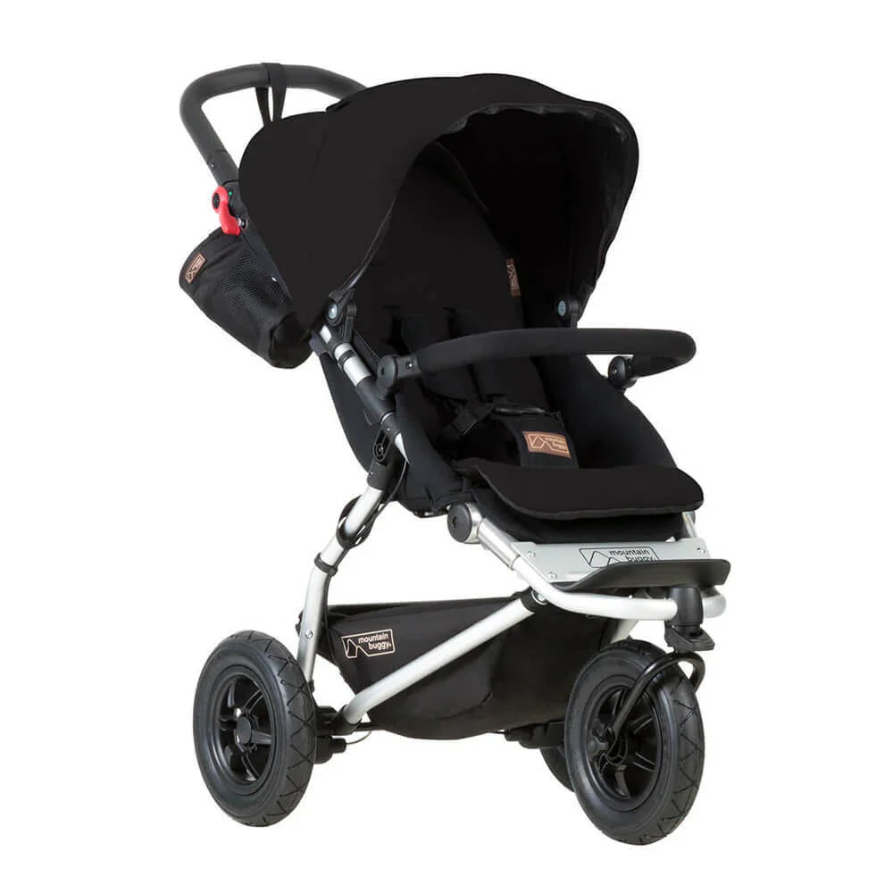 Black three-wheeled stroller from Mountain Buggy Swift, perfect with Odyssey Wagon Wheels for baby strollers
