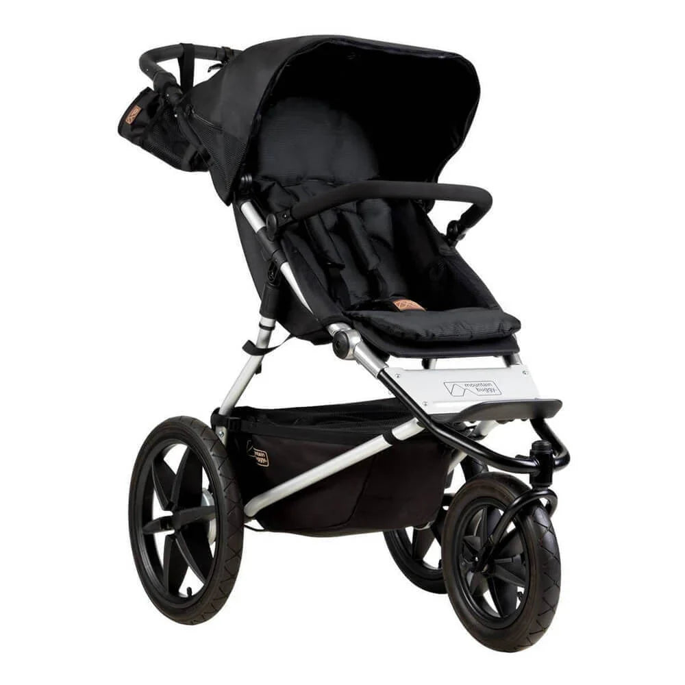 Black three-wheeled stroller from Mountain Buggy Terrain, the ultimate premium jogger baby stroller
