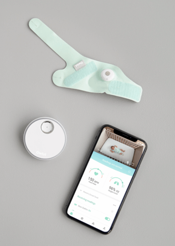 Baby monitoring system featuring Owlet Smart Sock 3 and Toshi Baby Romper for safe sleep