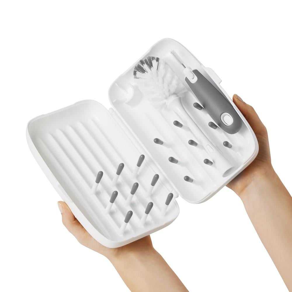 White bottle brush drying rack from OXO TOT On-The-Go all-in-one portable solution