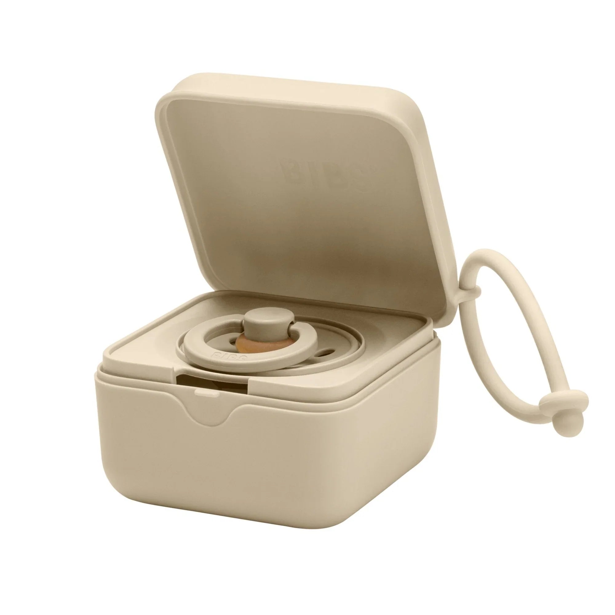Beige pacifier case with pacifier in BIBS Pacifier Box perfect for baby strollers and accessories