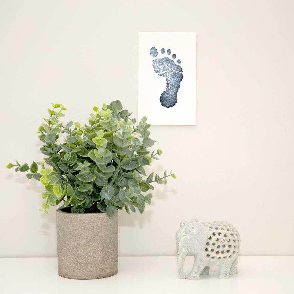 Decorative elephant candle holder with Pearhead Clean Touch Ink Pad for Toshi Baby