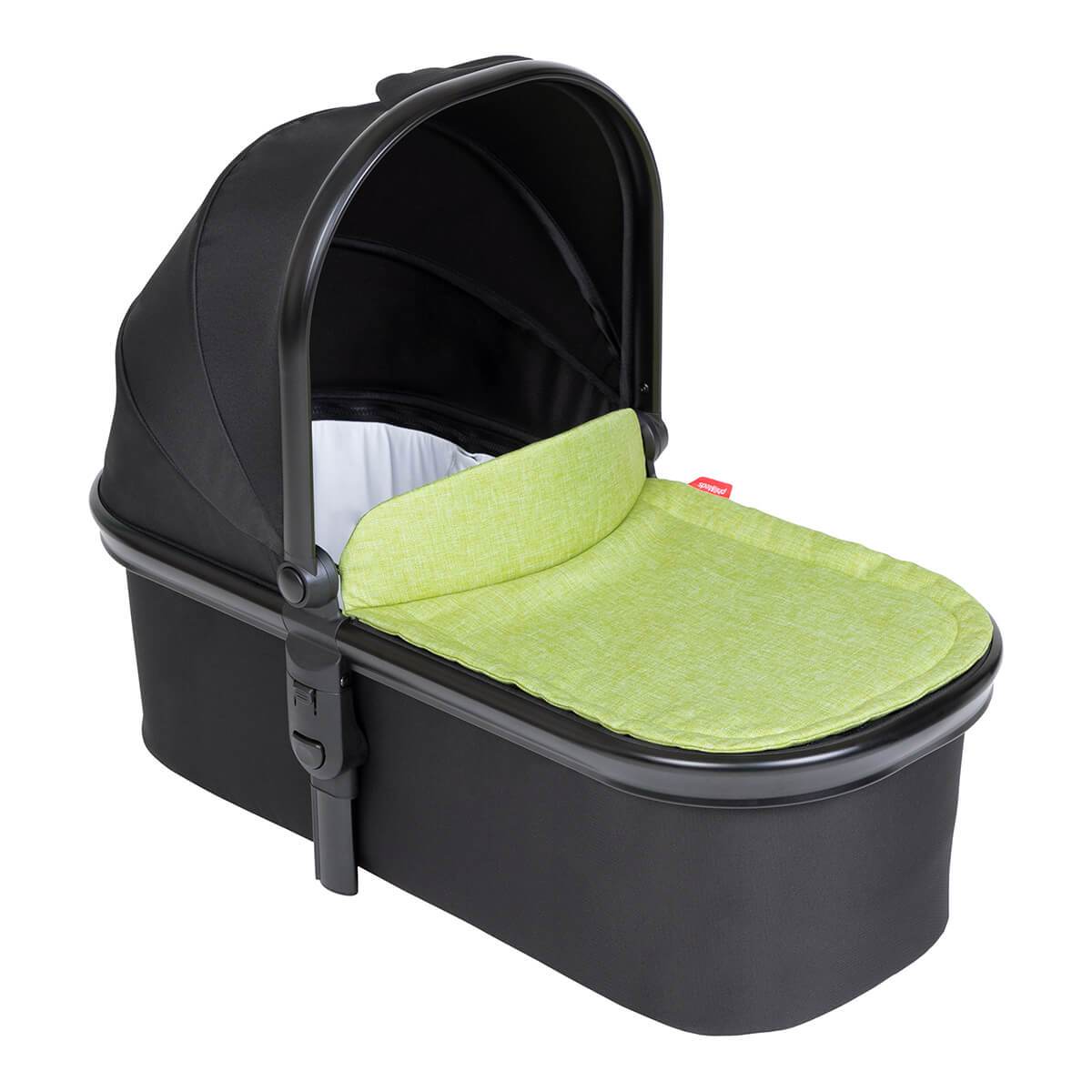 Black baby bassinet with green pad in Phil&Teds Snug Carrycot baby stroller setup