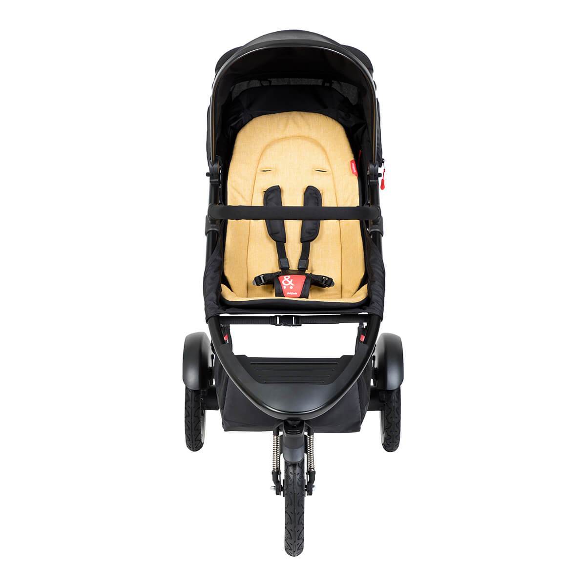 Black and tan three-wheeled Phil&Teds Sport buggy with toshi baby fabric sling seat
