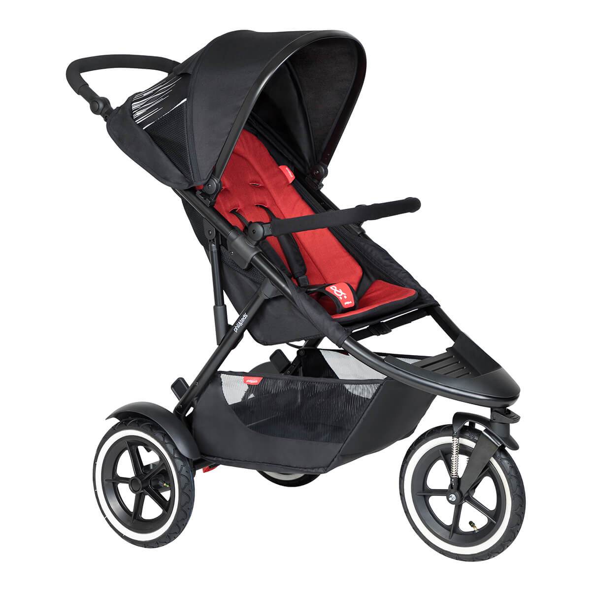 Black and red three-wheeled Phil Teds Sport buggy with toshi baby fabric sling seat