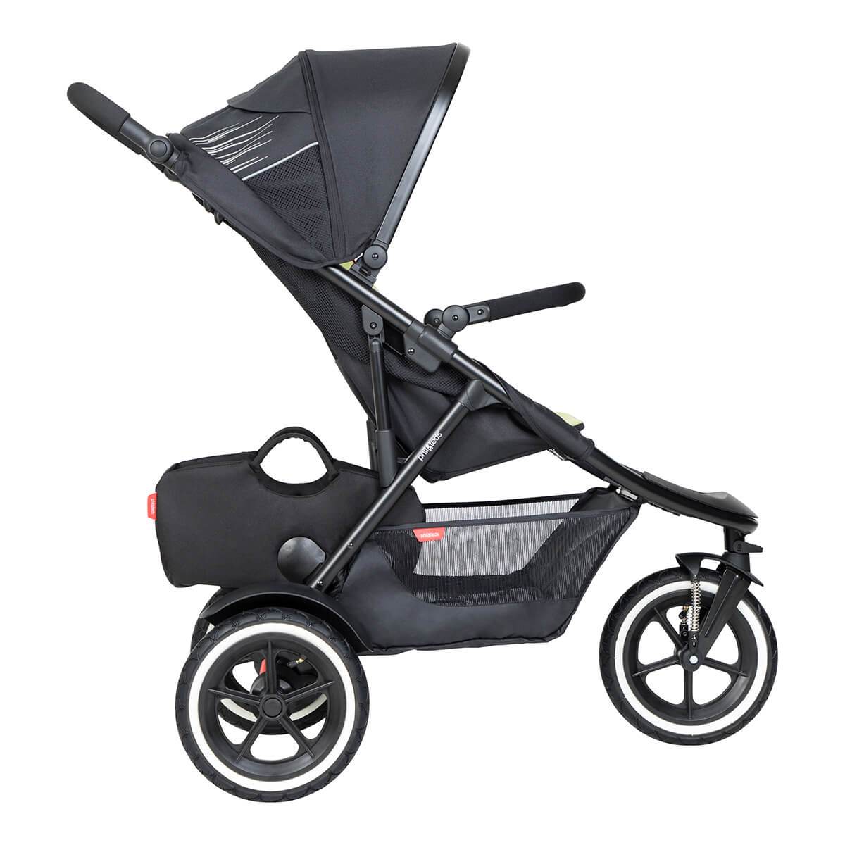 Black three-wheeled stroller from Phil&Teds tote inline storage, perfect with Toshi baby romper