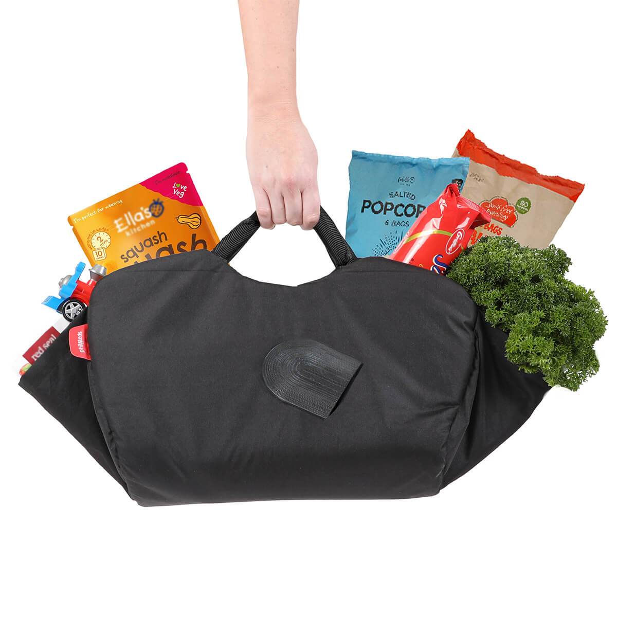 Black shopping bag filled with groceries for Phil&Teds Tote Inline storage and baby strollers