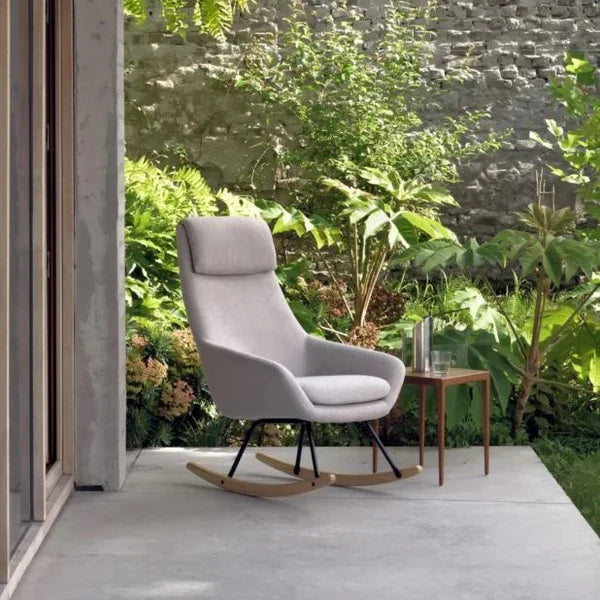 Upholstered Quax Nordic Rocking Chair with headrest, perfect for baby strollers or cozy nursery