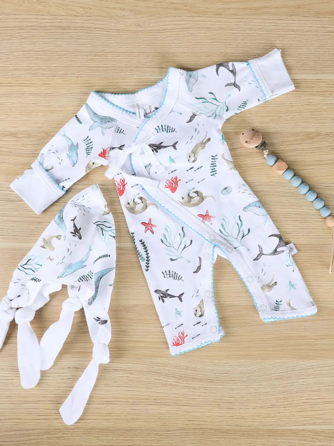 Toshi Baby Romper with sea creature print from Emotion & Kids Under the Sea Crossover Prem Outfit perfect for baby strollers