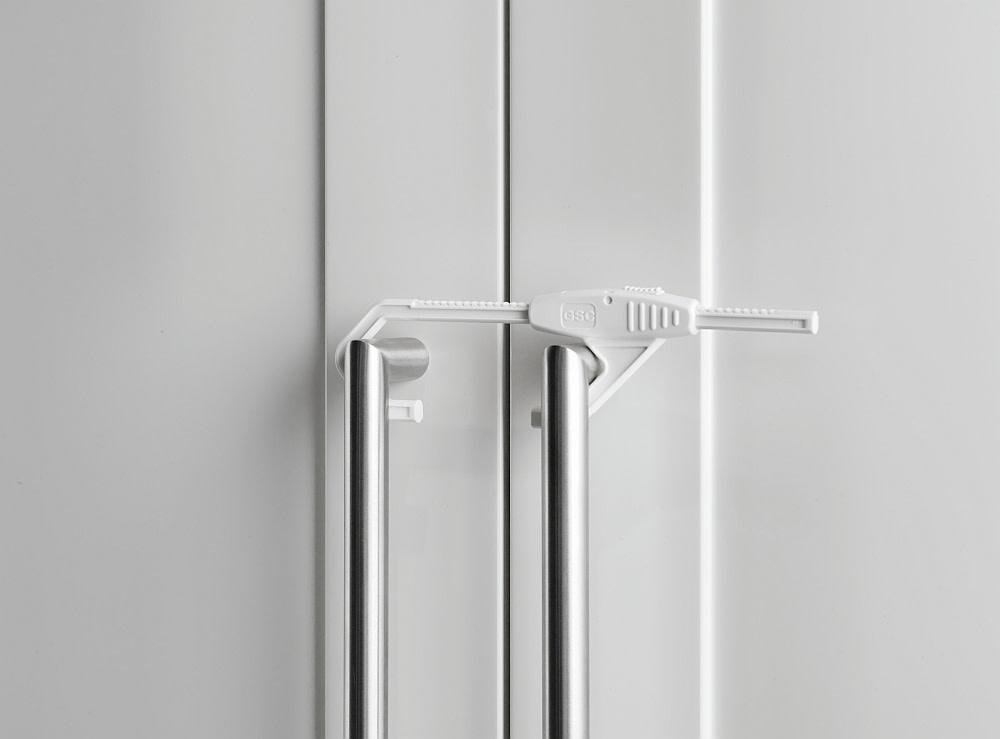 White plastic cabinet slide lock for Babydan Double or Toshi Baby cabinets