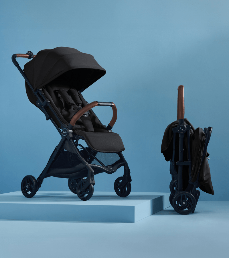 Black Silver Cross Jet stroller with brown accents open and folded, perfect toshi baby stroller hand luggage size