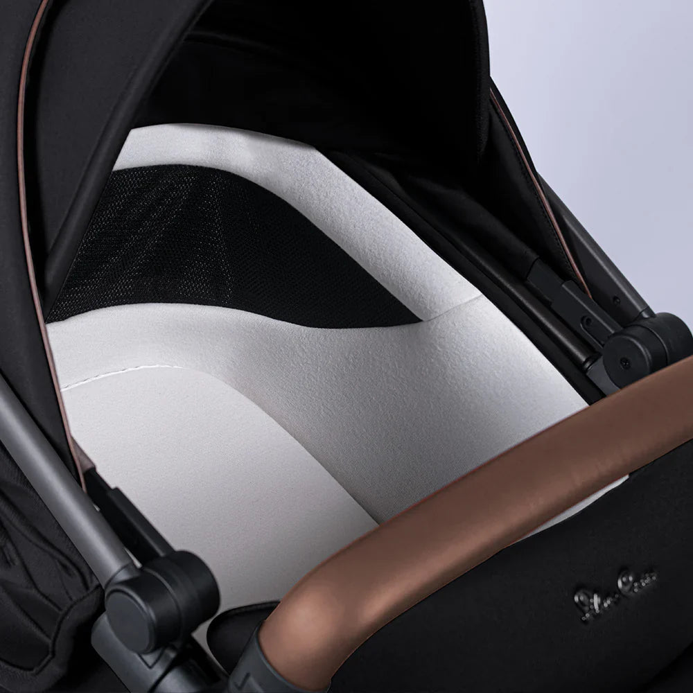 Black and white stroller interior of Silver Cross Wave baby strollers with Toshi Baby gear