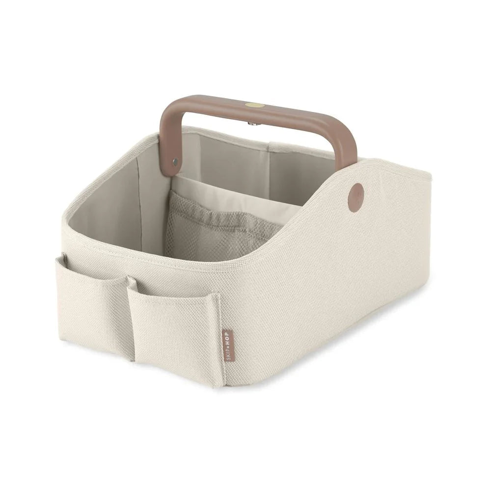 Beige fabric nappy caddy with wooden handle for Toshi Baby nursery, includes button batteries