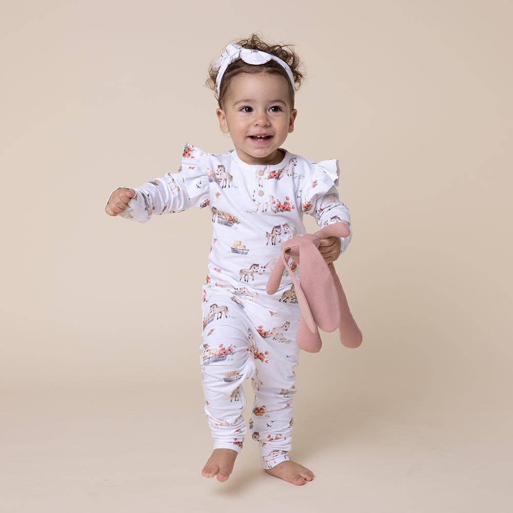 Toshi Baby Snuggle Hunny Pony Pals Organic Growsuit with plush toy and patterned pajamas