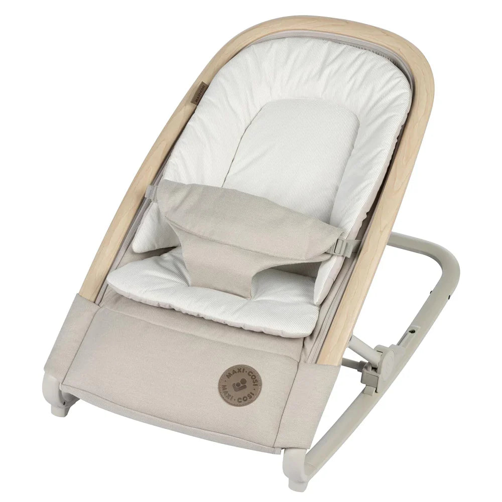 Beige and white Kori Rocker baby bouncer with Toshi Baby Romper, perfect with baby strollers