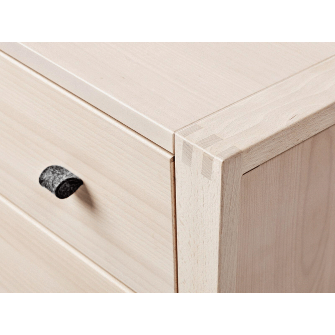 Light-colored wooden drawer dresser natural with dark handle, perfect for bare mum postpartum needs