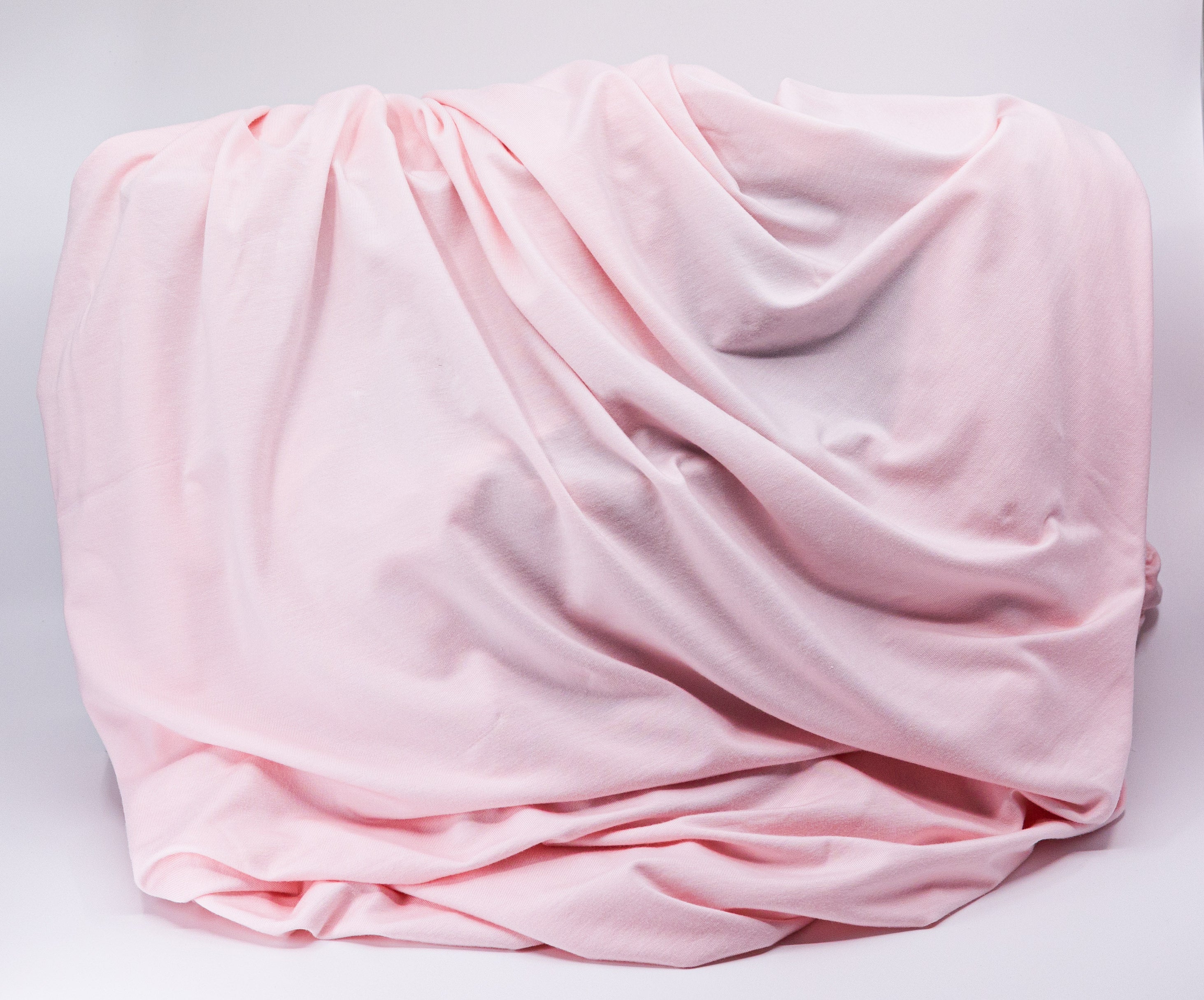 Pink draped fabric for Tasman Eco Fitted sheets, perfect for bare mum postpartum comfort