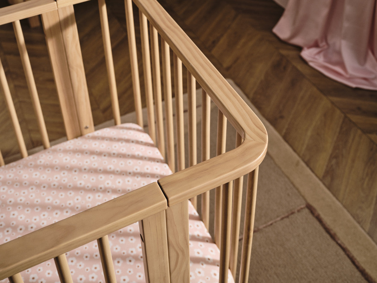 Wooden baby crib from Tasman Eco Pisa collection with a sandstone finish