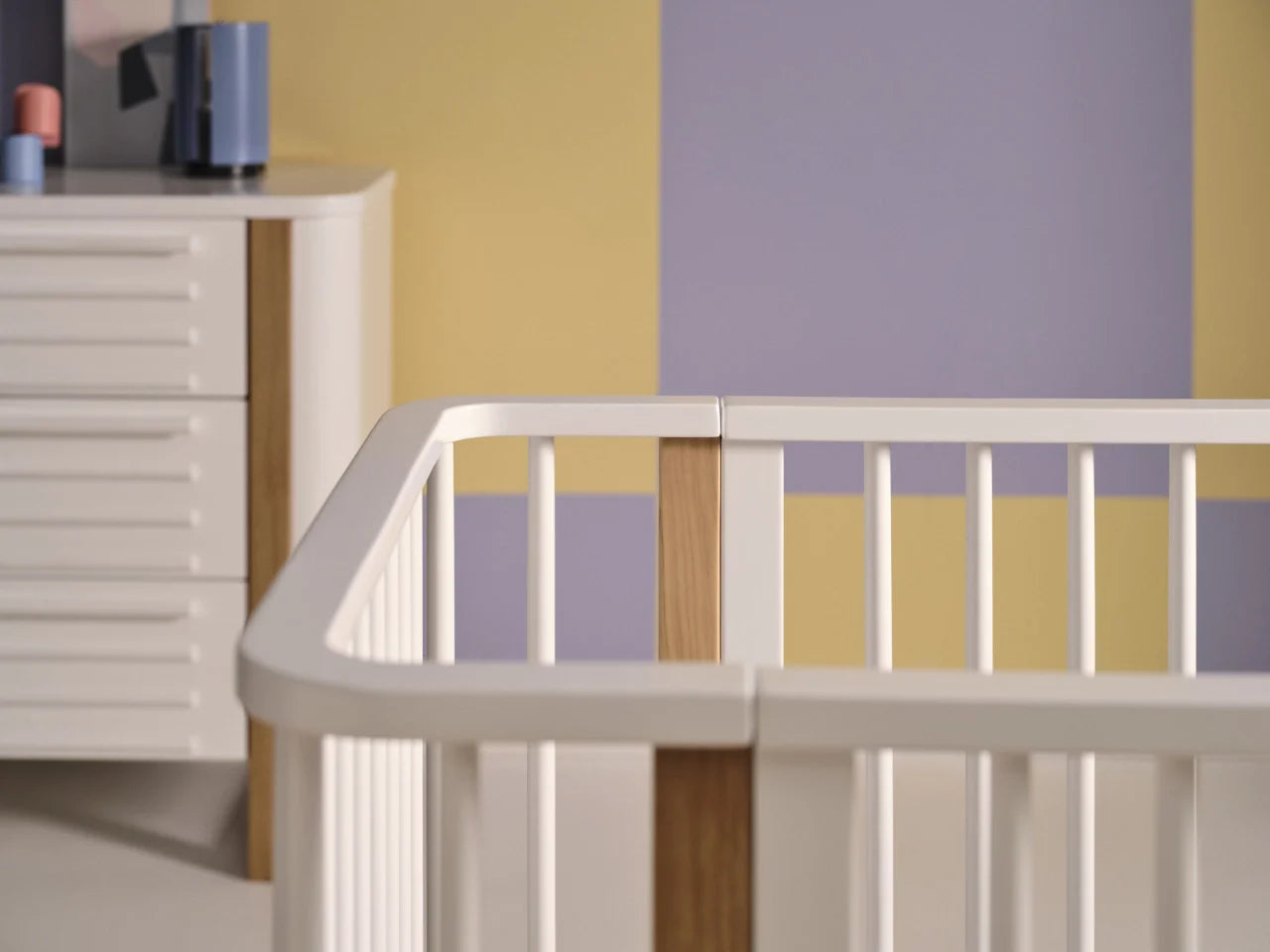White and wood crib from Tasman Eco Pisa collection, perfect for Toshi Baby nursery