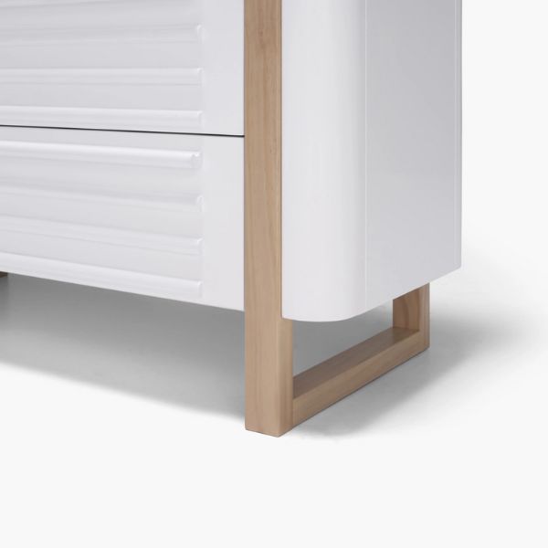White dresser with light wood frame from tasman eco pisa toshi baby collection