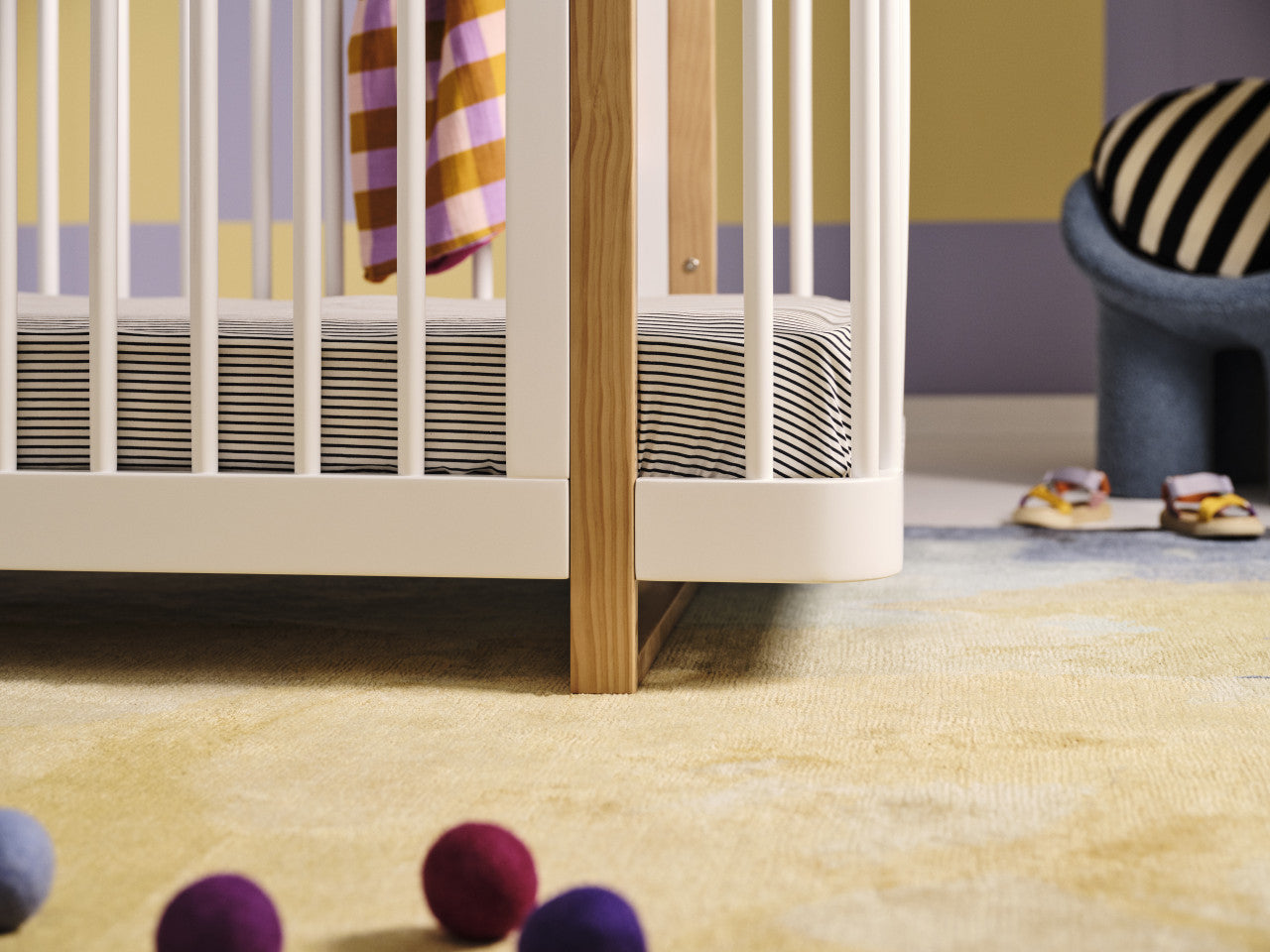 White and wood Tasman Eco Pisa Cot with Standard Mattress for Toshi Baby nursery setup