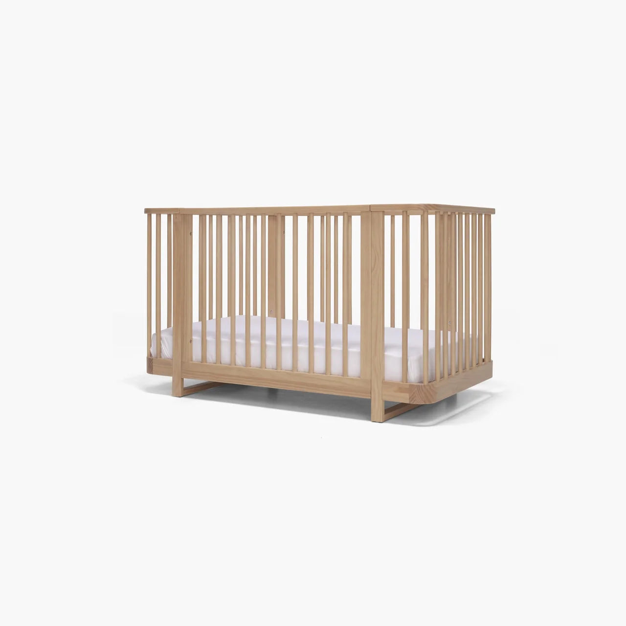 Wooden baby crib from Tasman Eco Pisa with Toshi Baby, perfect for your nursery