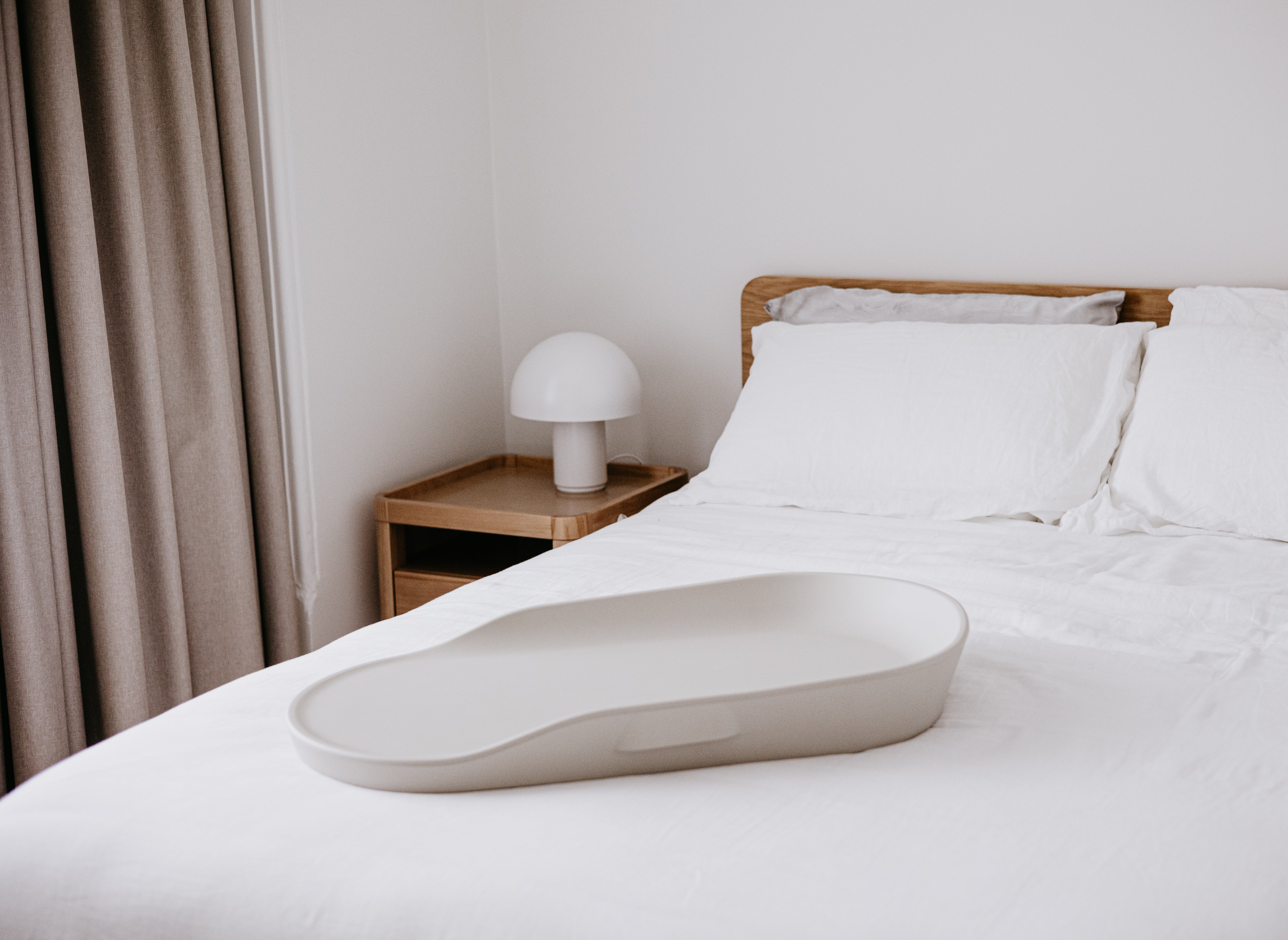 Oval gray changing tray on Tasman Eco Touzy Change Mat for Toshi Baby by Tasman Eco