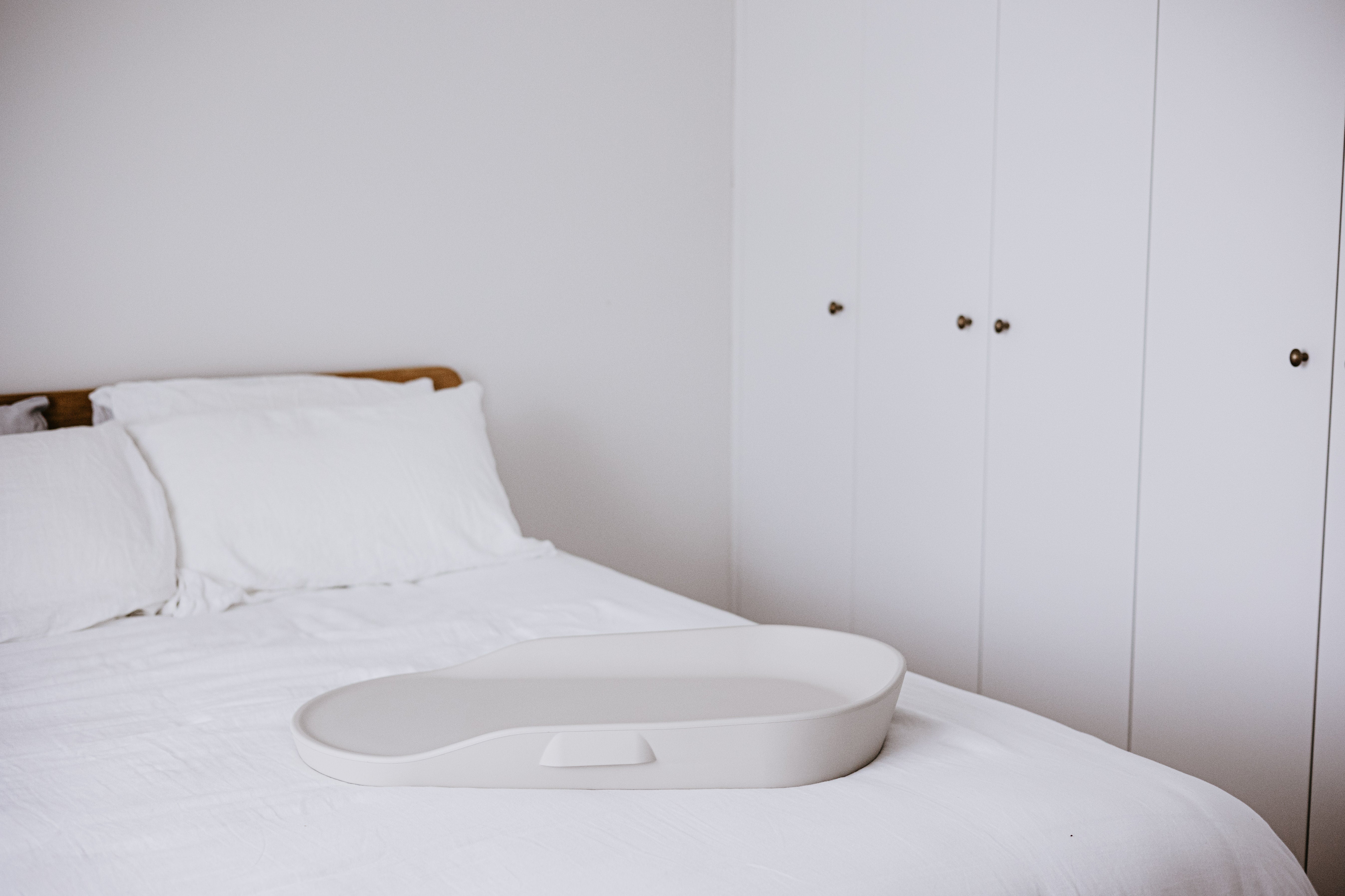 White bed tray on Tasman Eco Touzy Change Mat for Toshi Baby accessories