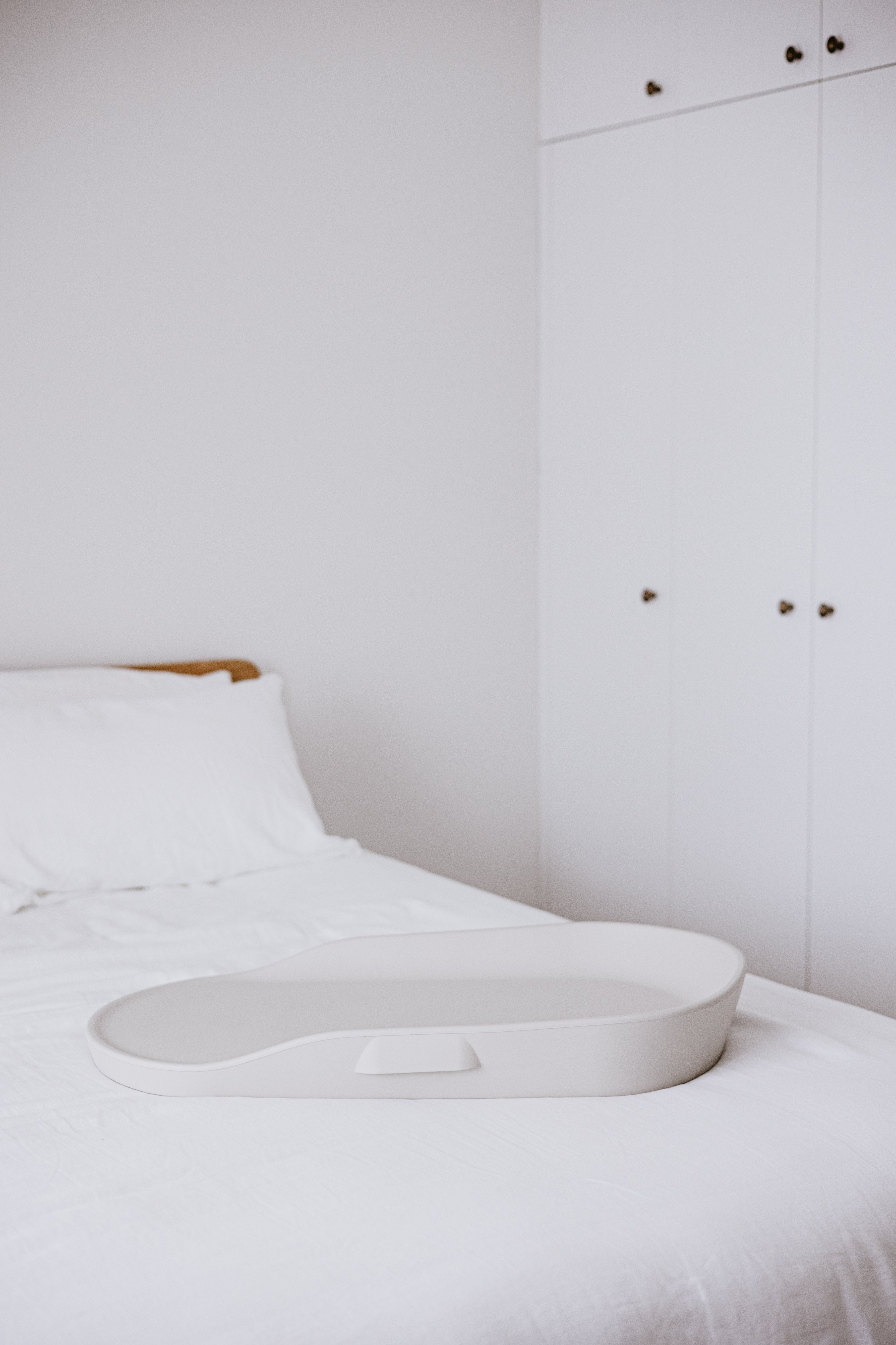 White oval bed tray perfect for Tasman Eco Touzy Change Mat baby strollers