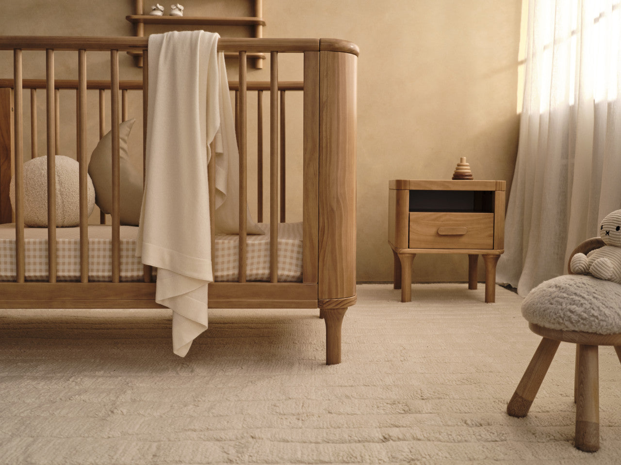 Wooden baby crib from Tasman Eco Willow Cot, perfect for stylish baby strollers setup