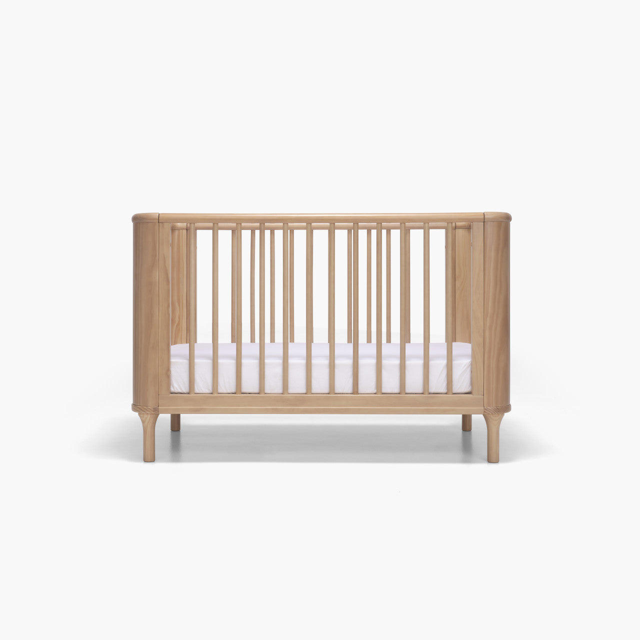 Wooden baby crib from Tasman Eco Willow Cot, perfect for cozy nursery setups and baby strollers