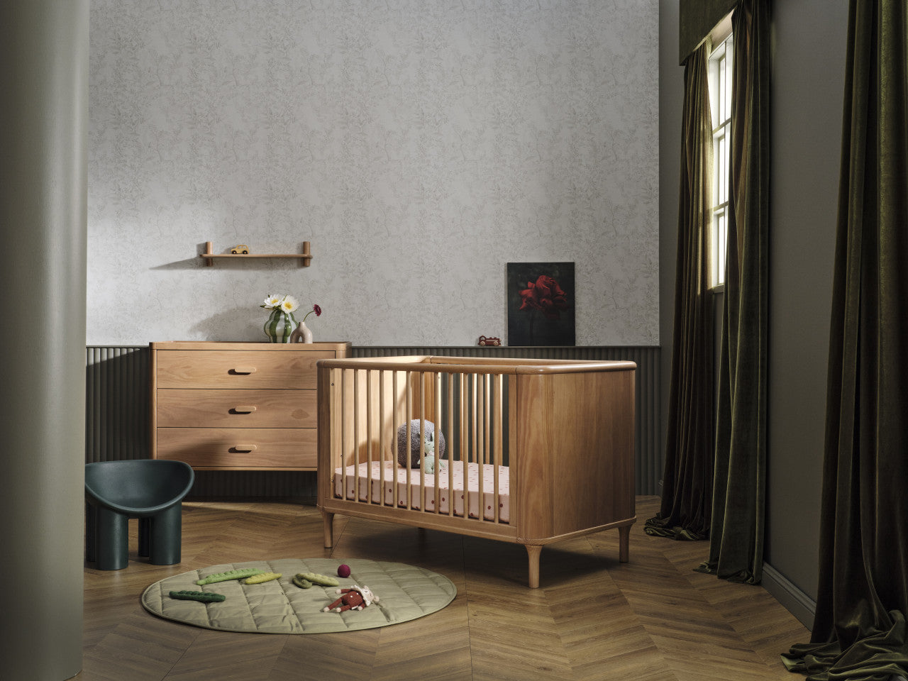 Wooden baby crib from Tasman Eco Willow with toshii baby romper in the shot