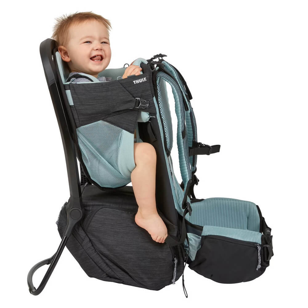 Thule Sapling Child Carrier backpack with machine washable seat and Toshi baby gear compartment