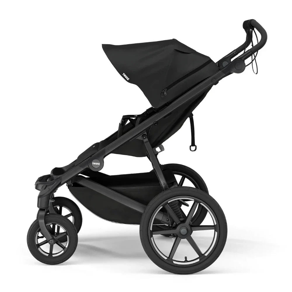 Black Thule Urban Glide all-terrain stroller with free bumper bar for easy jogging adventures