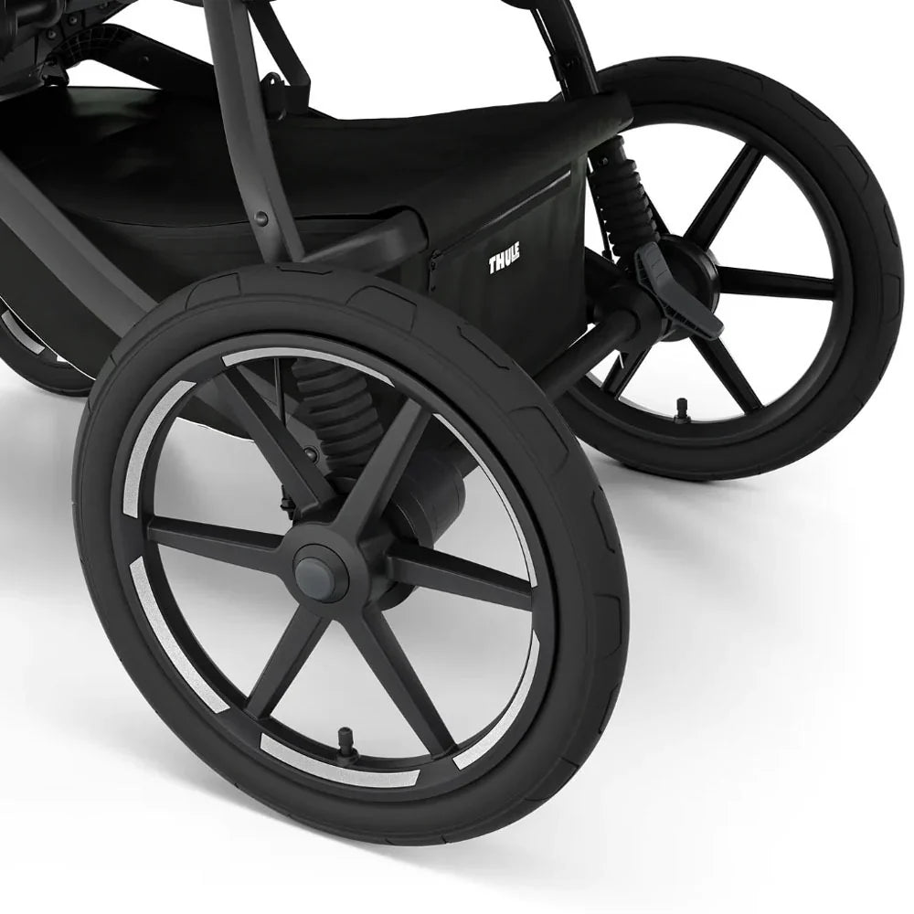 Black stroller wheels on Thule Urban Glide all-terrain baby strollers for smooth rides