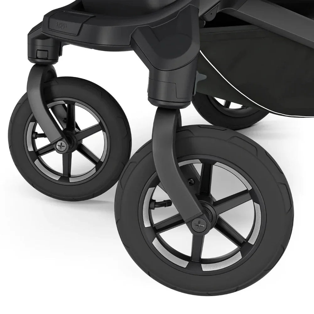 Black stroller wheels on Thule Urban Glide all-terrain stroller for baby strollers