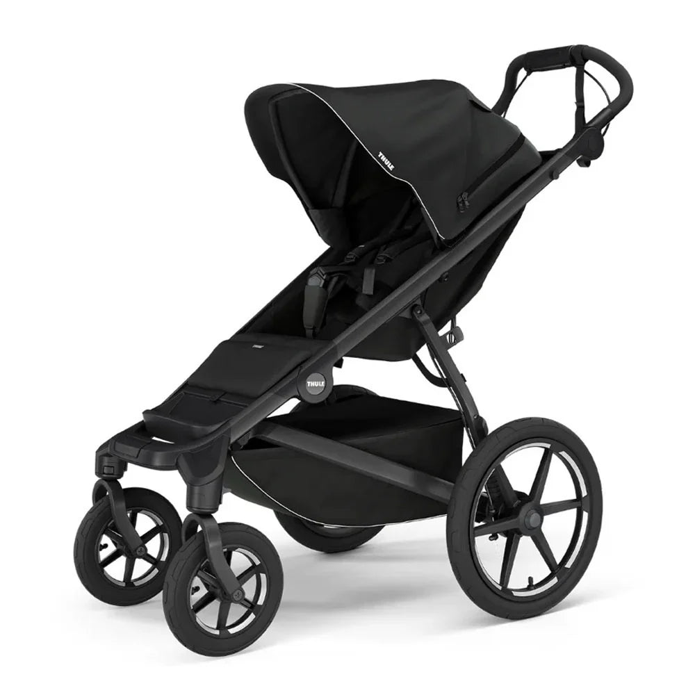 Black Thule Urban Glide all-terrain stroller with twist hand brake for smooth jogging