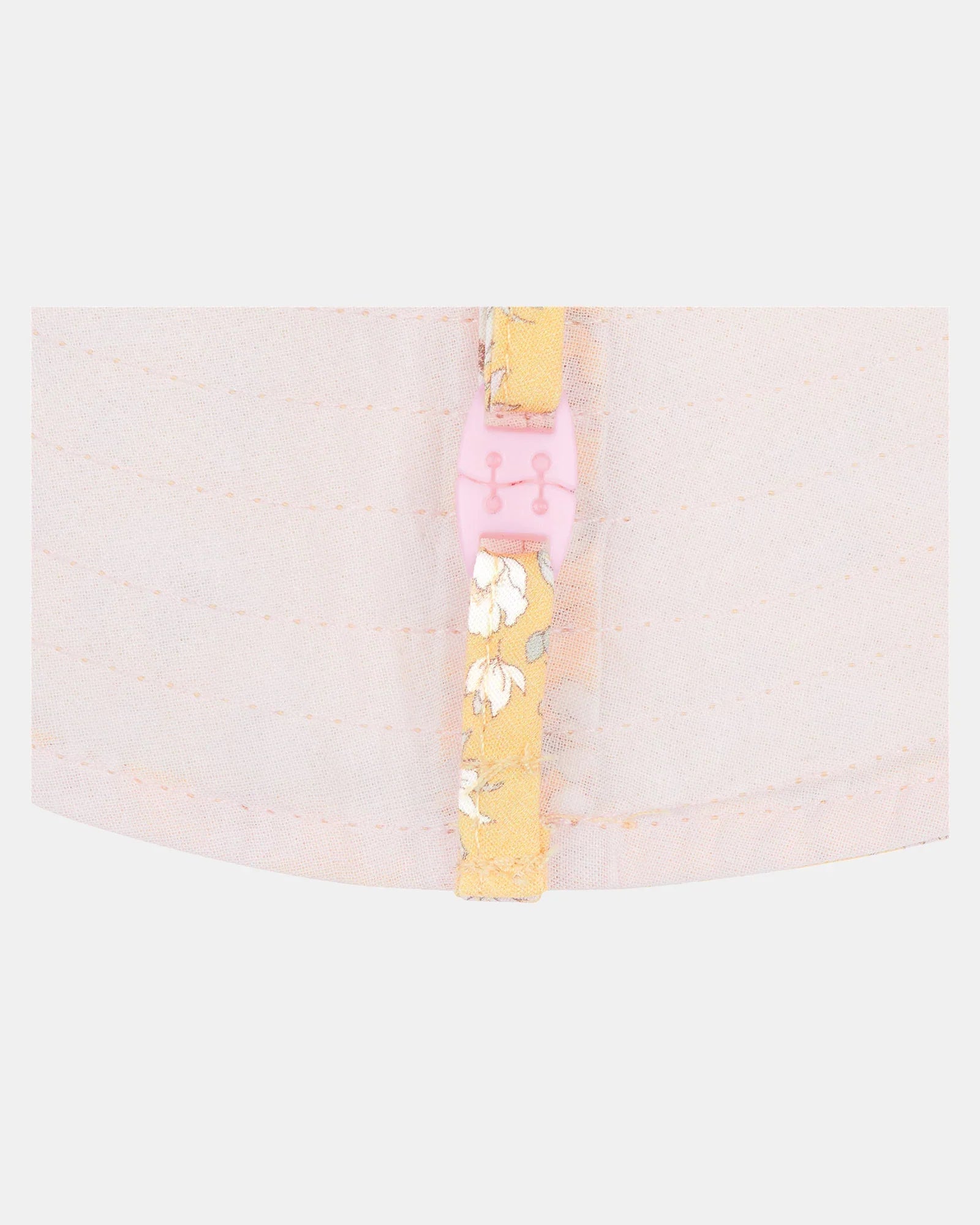 Floral-patterned yellow strap with pink buckle on Toshi Baby Sunhat Eva Sunny for baby strollers