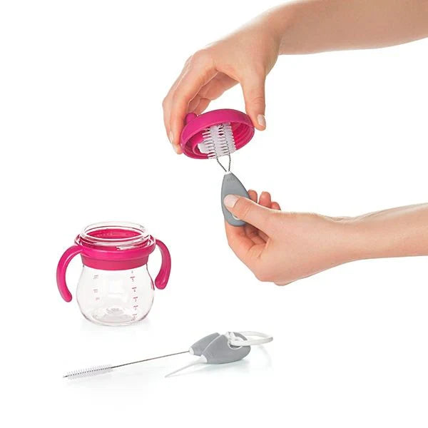 Pink clear sippy cup with cleaning brush, perfect for toshi baby pump parts or straw cleaning