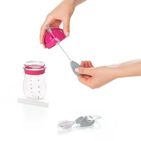 Pink and clear baby bottle with cleaning accessories for toshi baby pump parts brush