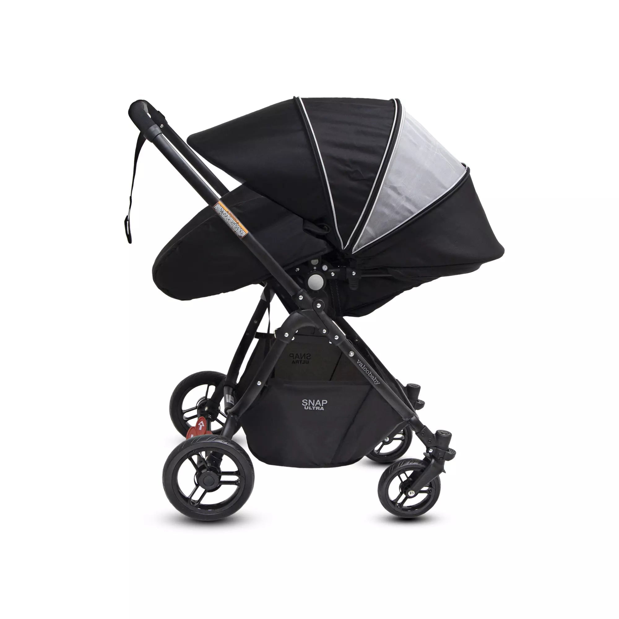 Black and gray Valco Baby Snap Ultra baby stroller with bassinet for Toshi Baby