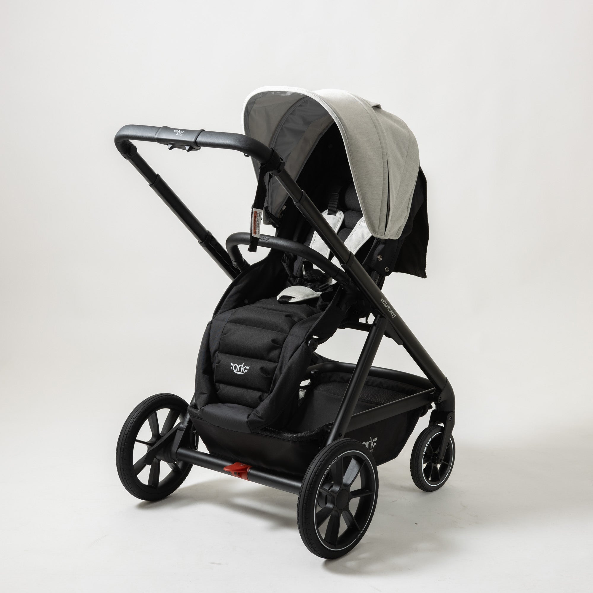 Black stroller with gray canopy from ValcoBaby ARK Joey Seat Bundle baby strollers
