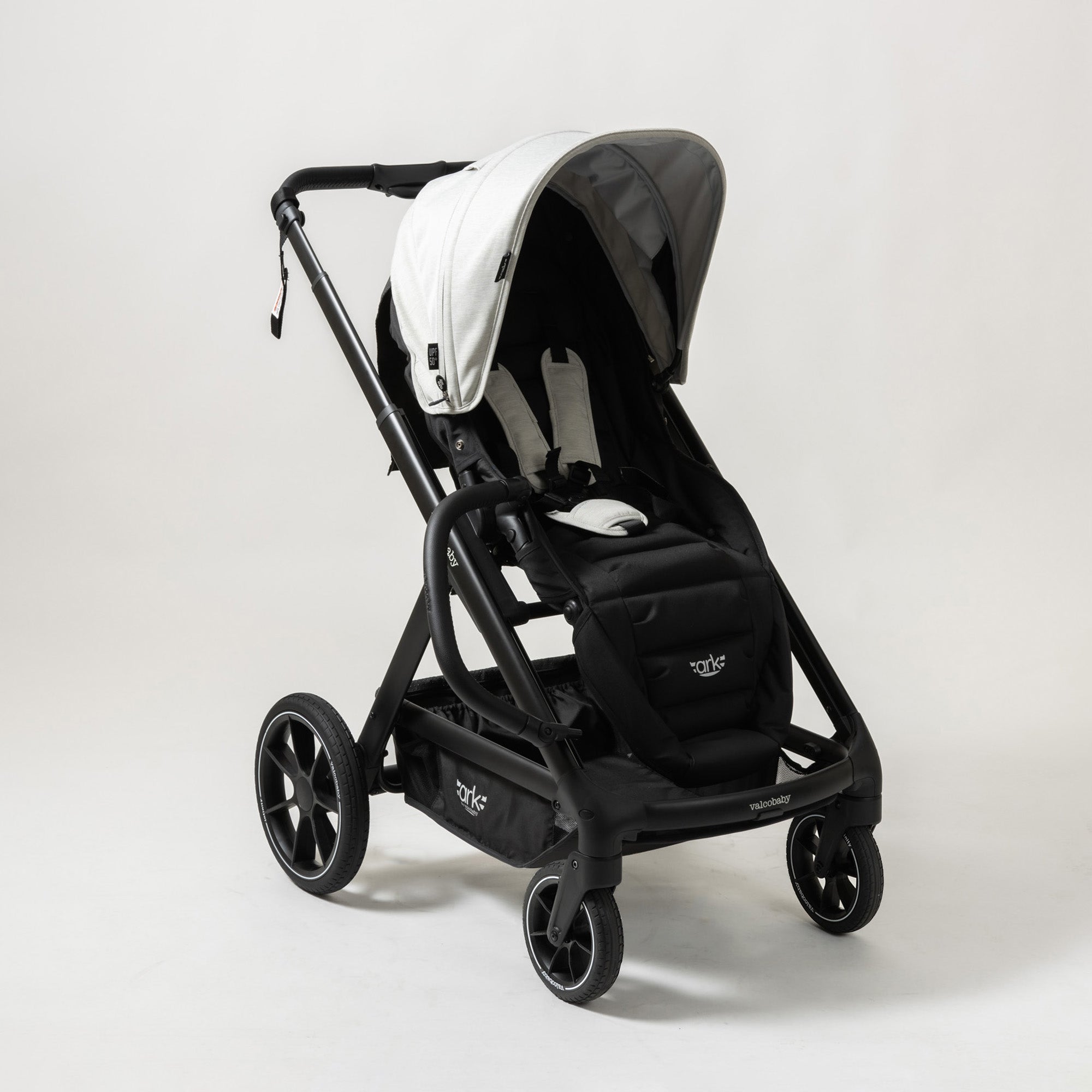 Black and white baby stroller with Joey Seat Bundle in Valcobaby ARK collection