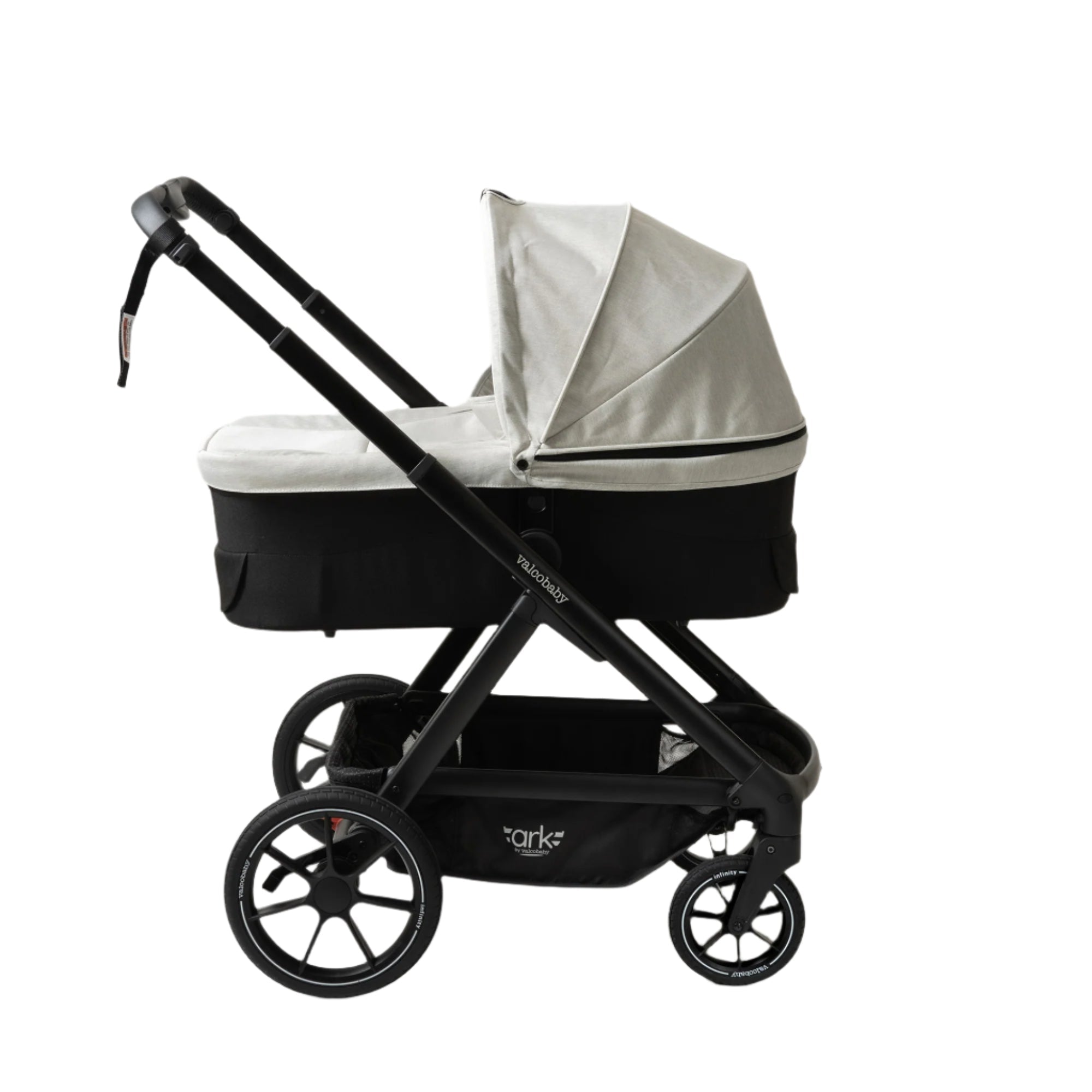 Black and silver baby stroller with valcobaby ark bassinet and odyssey wagon wheels